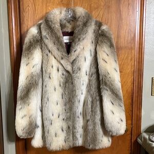 Woman vintage faux fur snow, leopard coat by Charles Klein